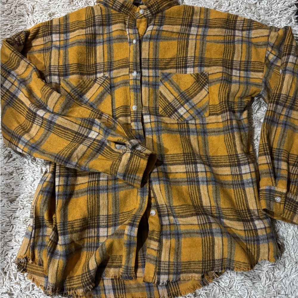 Women’s plaid flannel shirt.